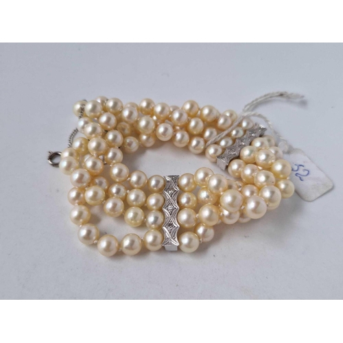 52 - A EDWARDIAN WHITE GOLD DIAMOND AND PEARL BRACELET 18CT GOLD 7 INCH BOXED