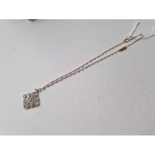 59 - A EDWARDIAN 18CT GOLD AND PLATINUM PEARL AND DIAMOND PENDANT ON 15CT GOLD AND PEARL NECK CHAIN 17 IN... 