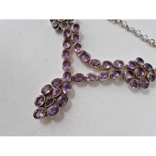 63 - AN IMPRESSIVE AMETHYST NECKLACE SET WITH 49 LARGE STONES 1ct to 5.5ct all in silver 76.8g