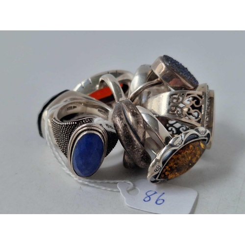 86 - Eight chunky silver rings 67 gms