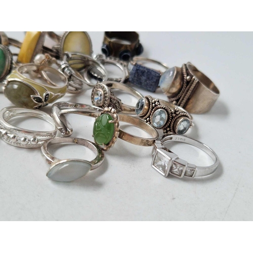 87 - Twenty six assorted silver rings 101 gms