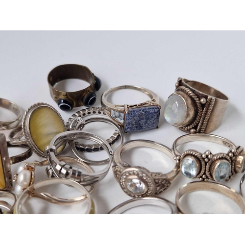 87 - Twenty six assorted silver rings 101 gms