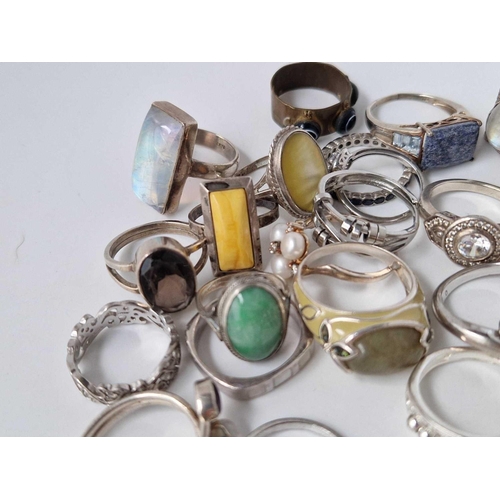 87 - Twenty six assorted silver rings 101 gms