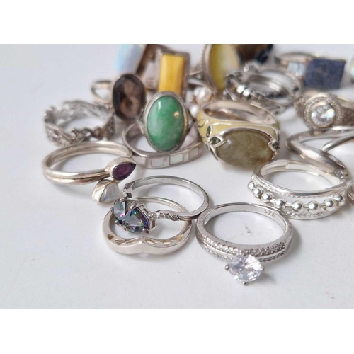 87 - Twenty six assorted silver rings 101 gms