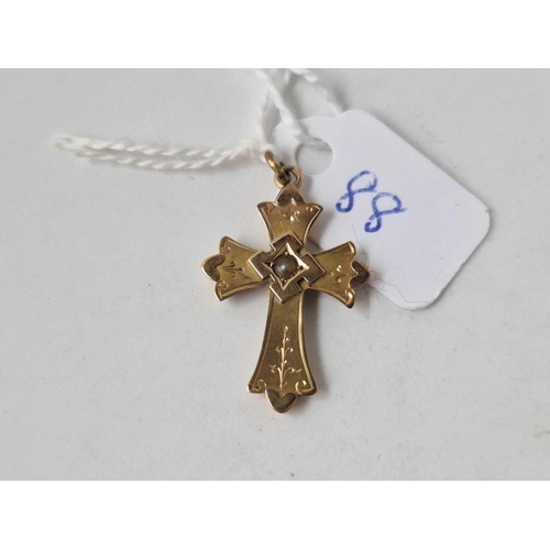 88 - A pearl set cross pendant 9ct