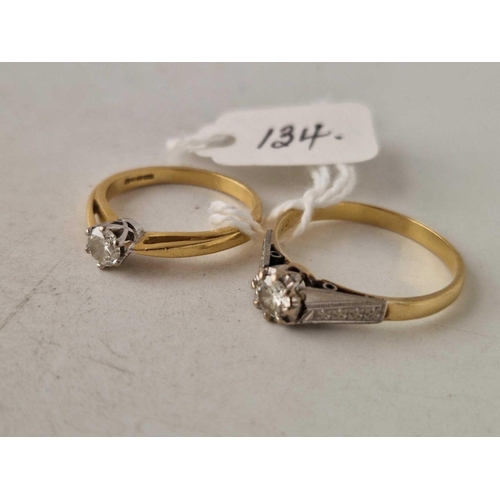 134 - TWO SOLITAIRE DIAMOND RINGS BOTH 18CT GOLD SIZES S AND L 5.5 GMS INC.