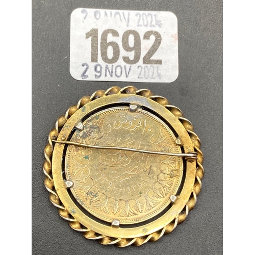 1692 - Middle Eastern gilt coin in mount