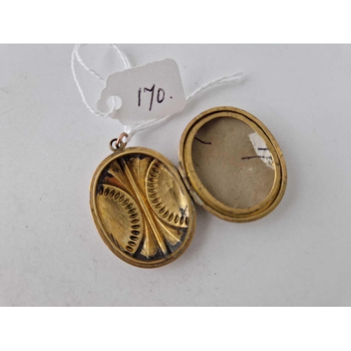 170 - A large Victorian gold back and front locket 7.7 gms