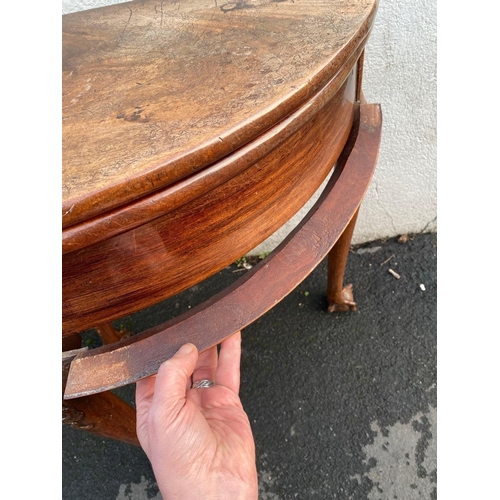 1710 - Mid 18th Century tea table, semi circular with folding top on Cabriloe legs with claw and ball feet