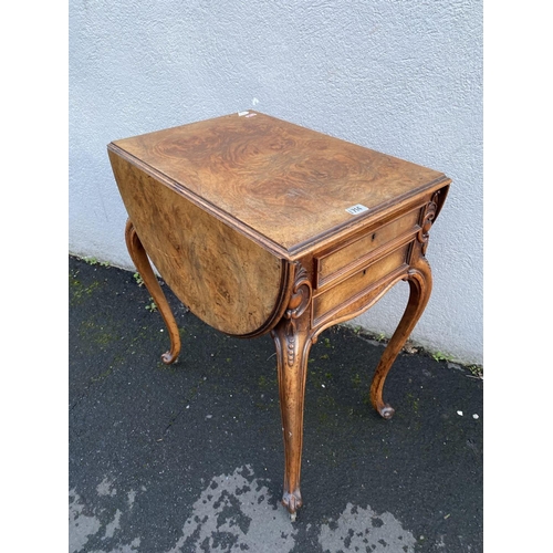 1714 - A 19th Century figured Walnut two lap sewing table with drawers and well under