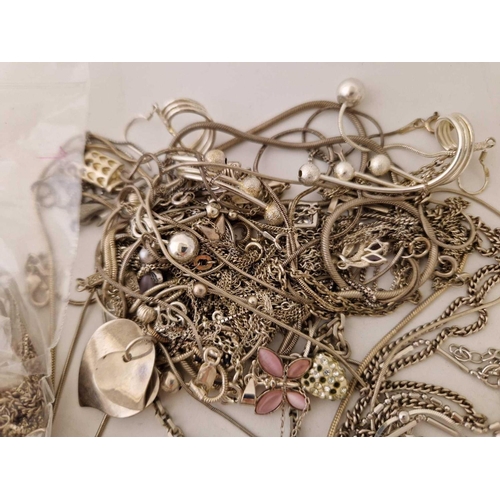 174 - A bag of assorted silver necklaces 190 gms