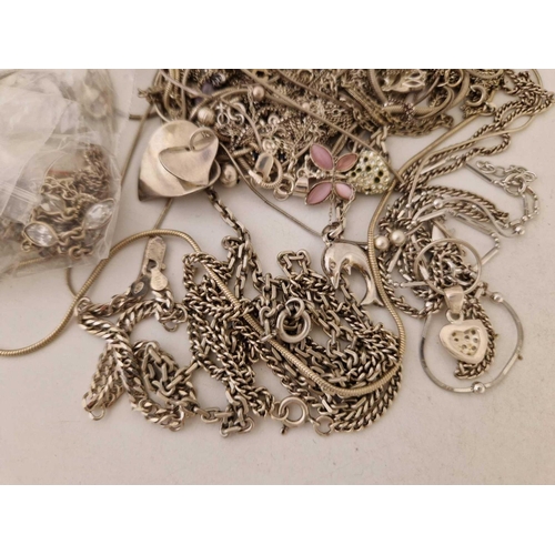 174 - A bag of assorted silver necklaces 190 gms