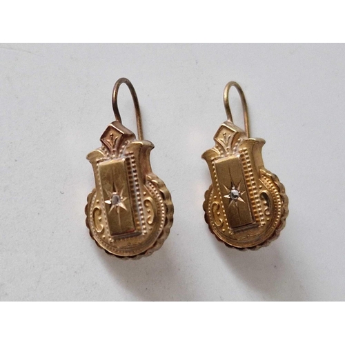 200 - A pair of Victorian gold and diamond earrings 2gms