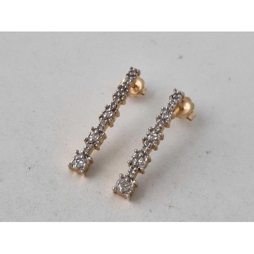 207 - A pair of multi diamond drop earrings 23mm drop