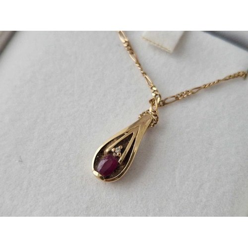 210 - A diamond and ruby pendant necklace 9ct 16 inch boxed