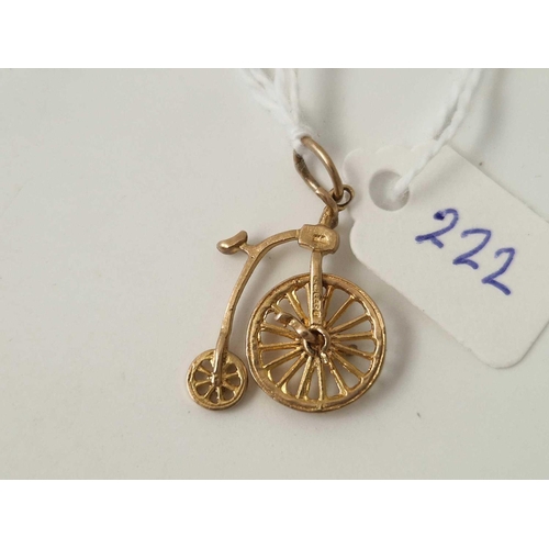 222 - A penny farthing articulated charm 9ct 1.8 gms