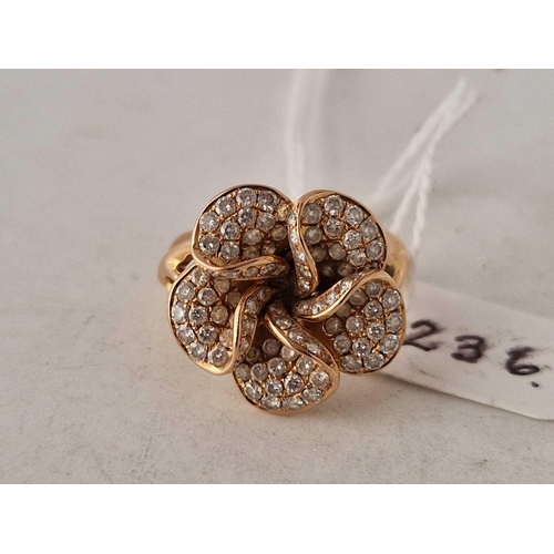 236 - A CONTEMPORARY DIAMOND FLOWER RING 18CT GOLD SIZE P 8.3 GMS