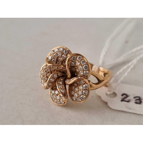 236 - A CONTEMPORARY DIAMOND FLOWER RING 18CT GOLD SIZE P 8.3 GMS