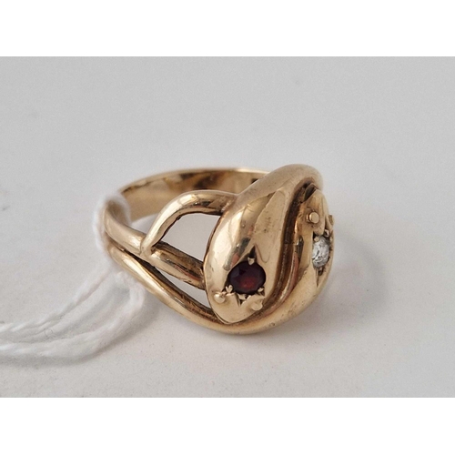 254 - A GARNET AND DIAMOND SNAKE RING 9CT SIZE Y 8.8 GMS