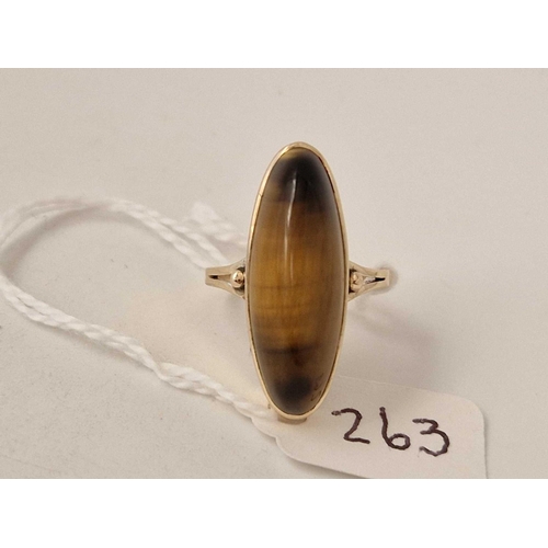 263 - 1960�s 14ct, marked in shank, single stone cabochon tigers eye ring, size M, 4.7g