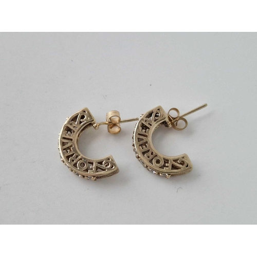 309 - A pair of forever hoop earrings 9ct 3.8 gms