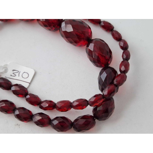 310 - A antique cherry Bakelite cut beads 23 inch 33.6 gms