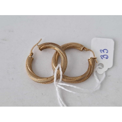 33 - A pair of hoop earrings 9ct 2 gms