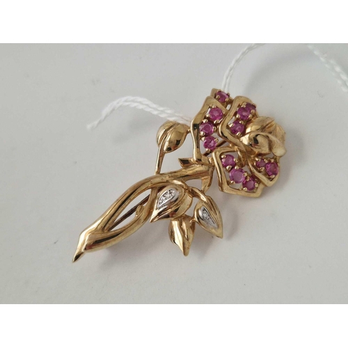 351 - A RUBY AND DIAMOND FLORAL BROOCH 9CT 8.5 GMS BOXED