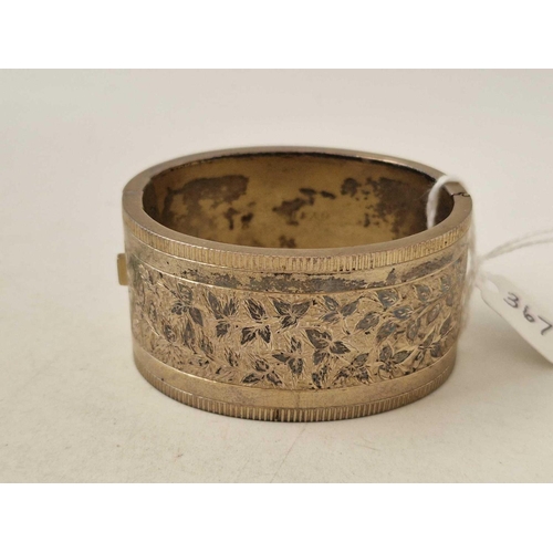 367 - Antique Victorian silver cuff bangle with chased floral decoration to the front, hallmarked Birmingh... 