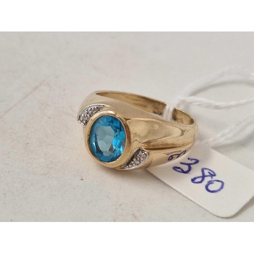 380 - A gold signet ring set with blue topaz and diamonds 9ct size T 6.4 gms