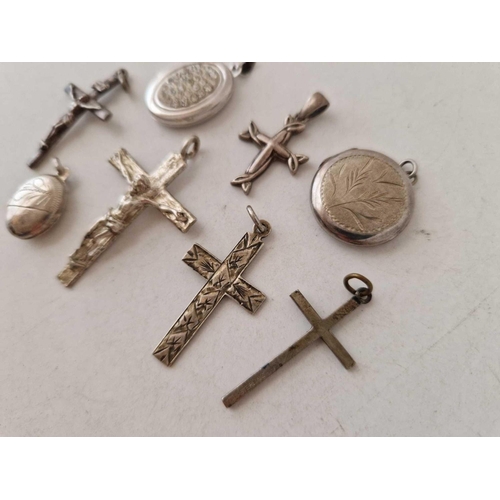 386 - Five silver cross pendant and three lockets