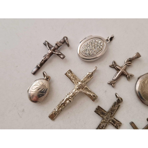 386 - Five silver cross pendant and three lockets