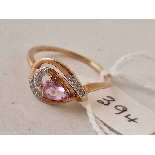 394 - A pink sapphire and diamond ring 10ct gold size Q 2.1 gms