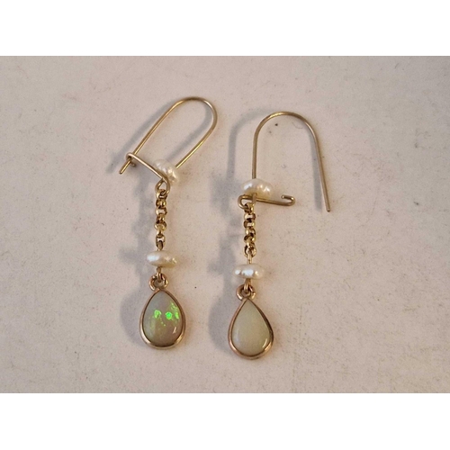 396 - A pair of gold and opal drop earrings