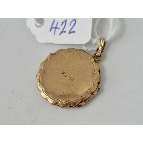 422 - A fancy back and front locket 9ct 3.3 gms