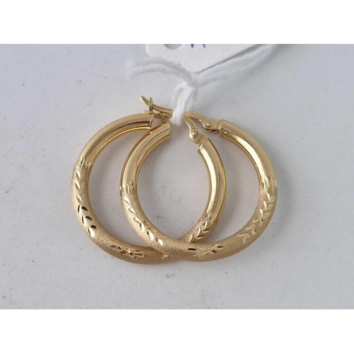 423 - A pair of hoop earrings 14ct gold 2.4 gms