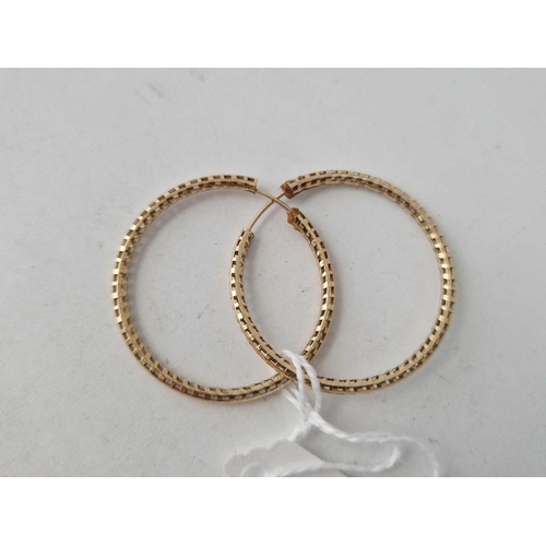 424 - A pair of large hoop earrings 9ct 1.6 gms