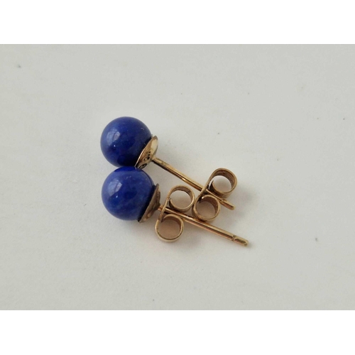 440 - A pair of lapis lazuli stud earrings 9ct 1.3 gms