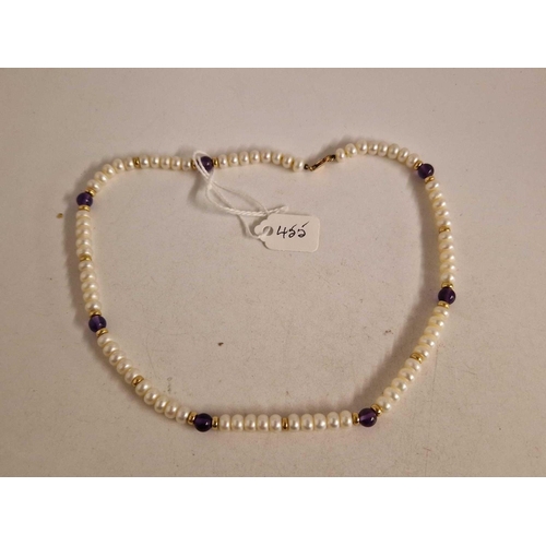 455 - A pearl and amethyst necklaces with 9ct clasp 15 inch 20 gms