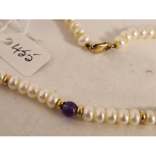 455 - A pearl and amethyst necklaces with 9ct clasp 15 inch 20 gms