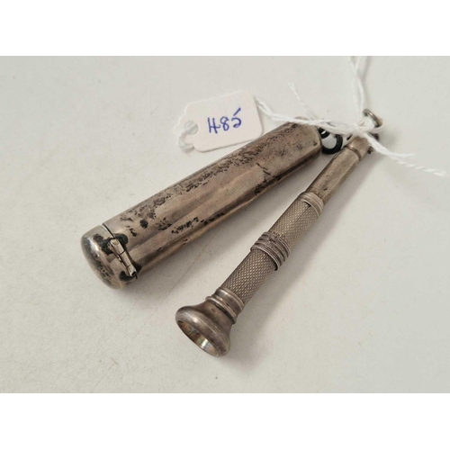 485 - A silver cigar piercer and and case