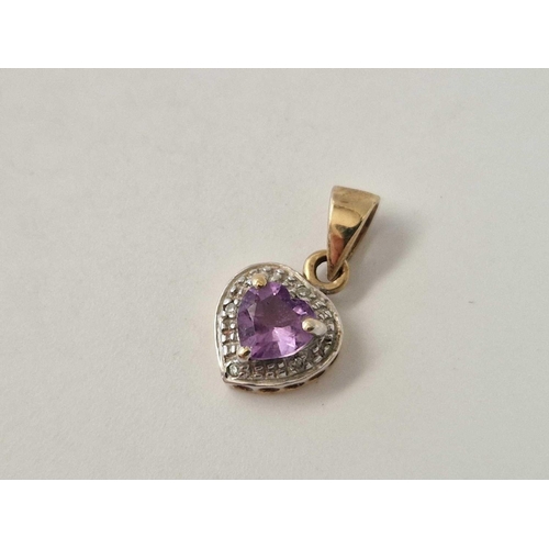 494 - A pair of small amethyst and diamond heart earrings and pendant in gold 1.8 gms