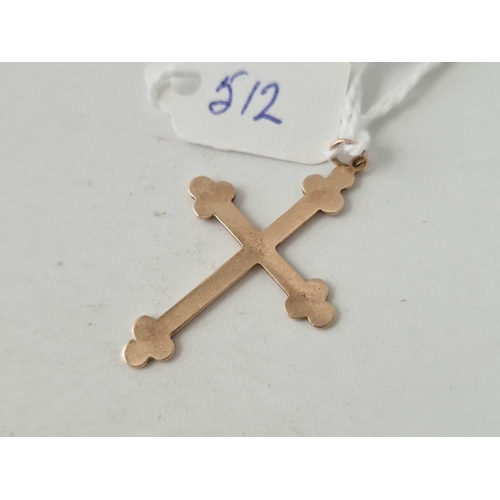 512 - A cross pendant 9ct 1.7 gms