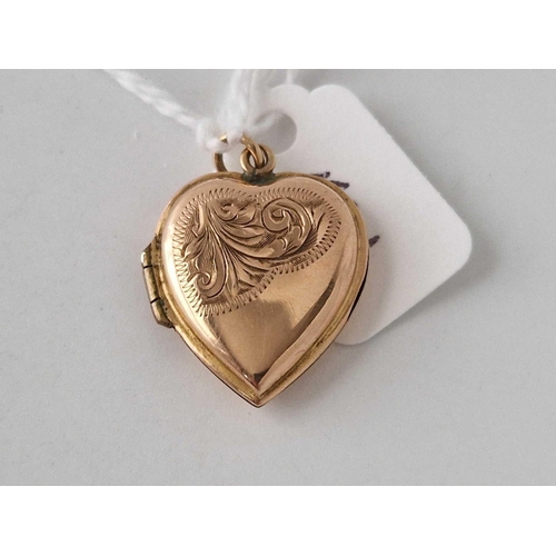 521 - A back and front heart locket 9ct 2.7 gms