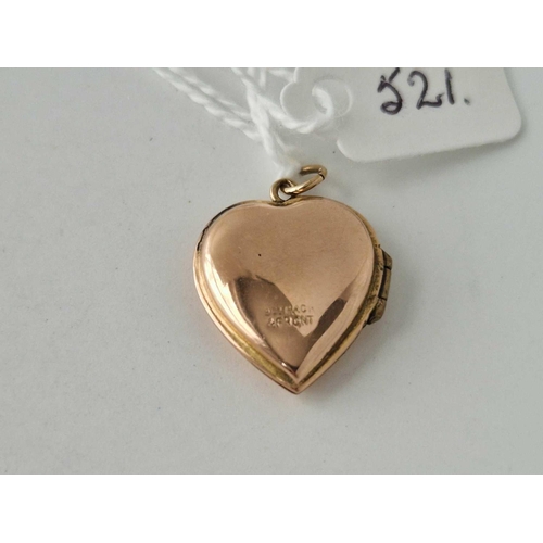 521 - A back and front heart locket 9ct 2.7 gms