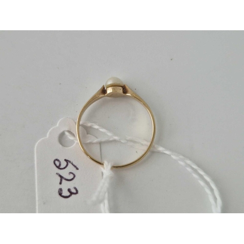 523 - A pearl ring 14ct gold size M 1.1 gms