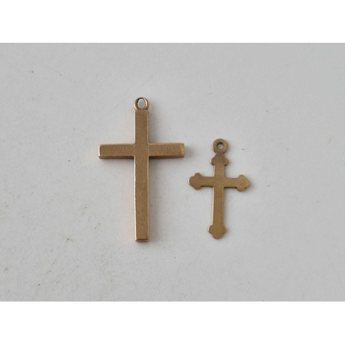 528 - Two 9ct crosses 1.5 gms