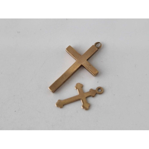 528 - Two 9ct crosses 1.5 gms