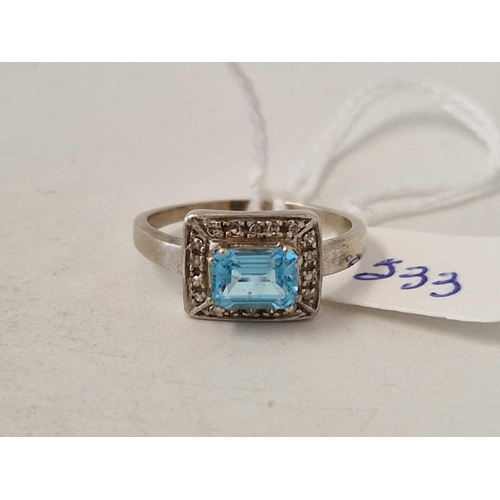 533 - A white gold blue topaz and diamond ring 9ct size Q 2.9 gms