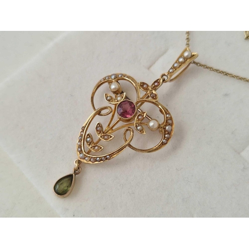 56 - A EDWARDIAN PINK TOURMALINE PERIDOT AND PEARL PENDANT ON 15CT GOLD 15 INCH CHAIN